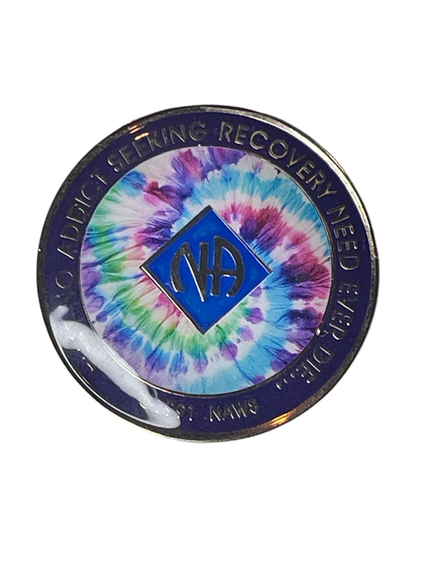 Narcotics Anonymous tie-dye recovery medallion with blue outer ring and multicolor center design, featuring the NA logo and the quote “That No Addict Seeking Recovery Need Ever Die,” symbolizing unity, hope, and spiritual freedom in recovery.