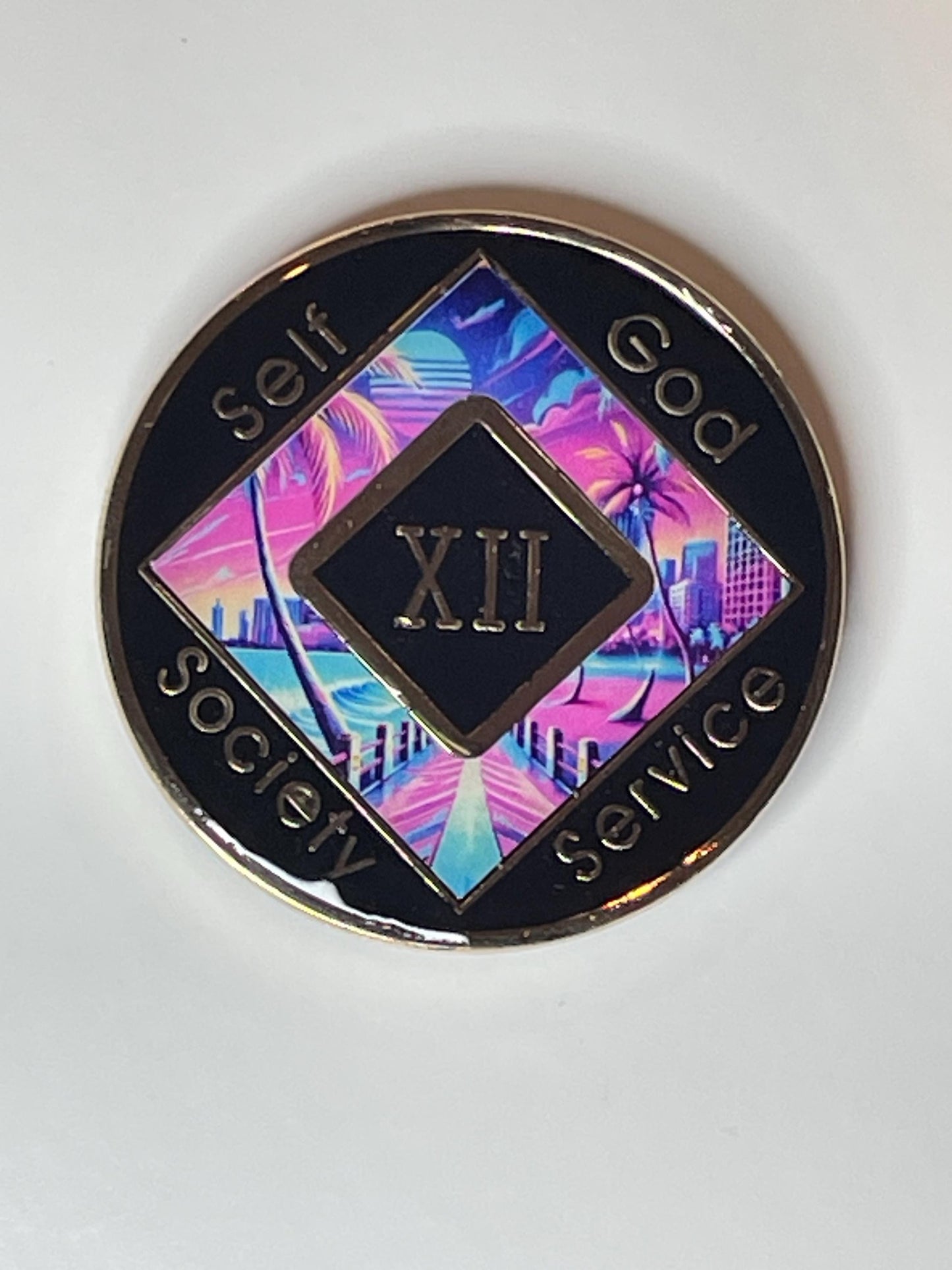 Narcotics Anonymous 12-year recovery medallion with a Miami Vice–style design featuring a neon sunset cityscape, palm trees, and ocean pier, symbolizing freedom, balance, and spiritual growth in sobriety.