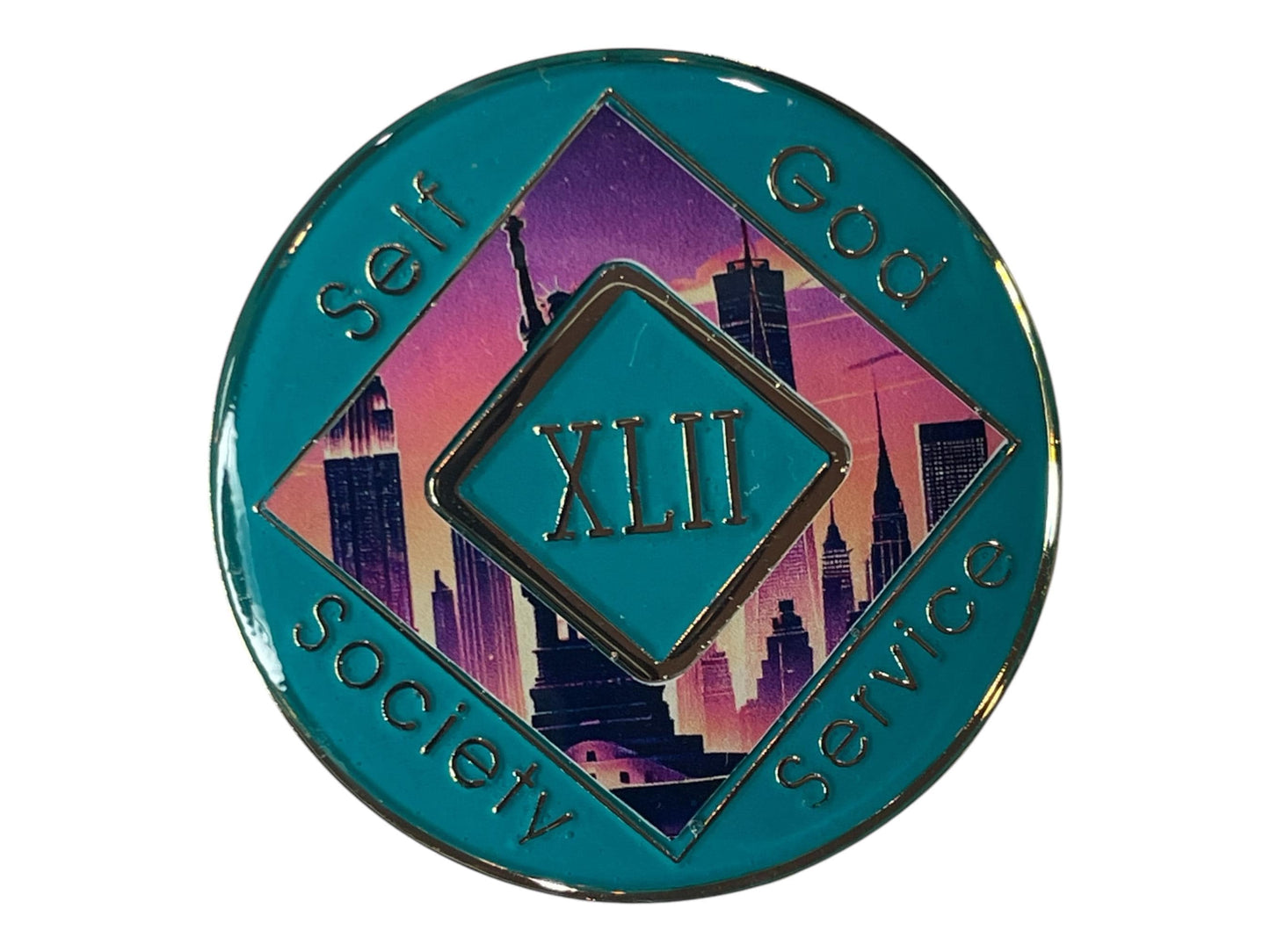 Narcotics Anonymous 42-year recovery medallion featuring the Statue of Liberty and New York City skyline at sunset, symbolizing freedom, perseverance, and the strength found in long-term recovery.