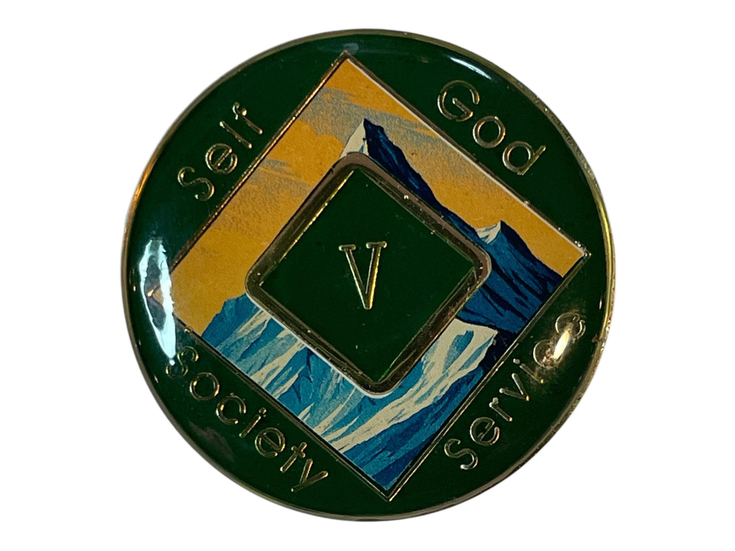 Narcotics Anonymous 5-year green recovery medallion featuring a mountain design and the words โSelf, God, Society, Service,โ symbolizing personal growth, spiritual strength, and perseverance on the recovery journey.
