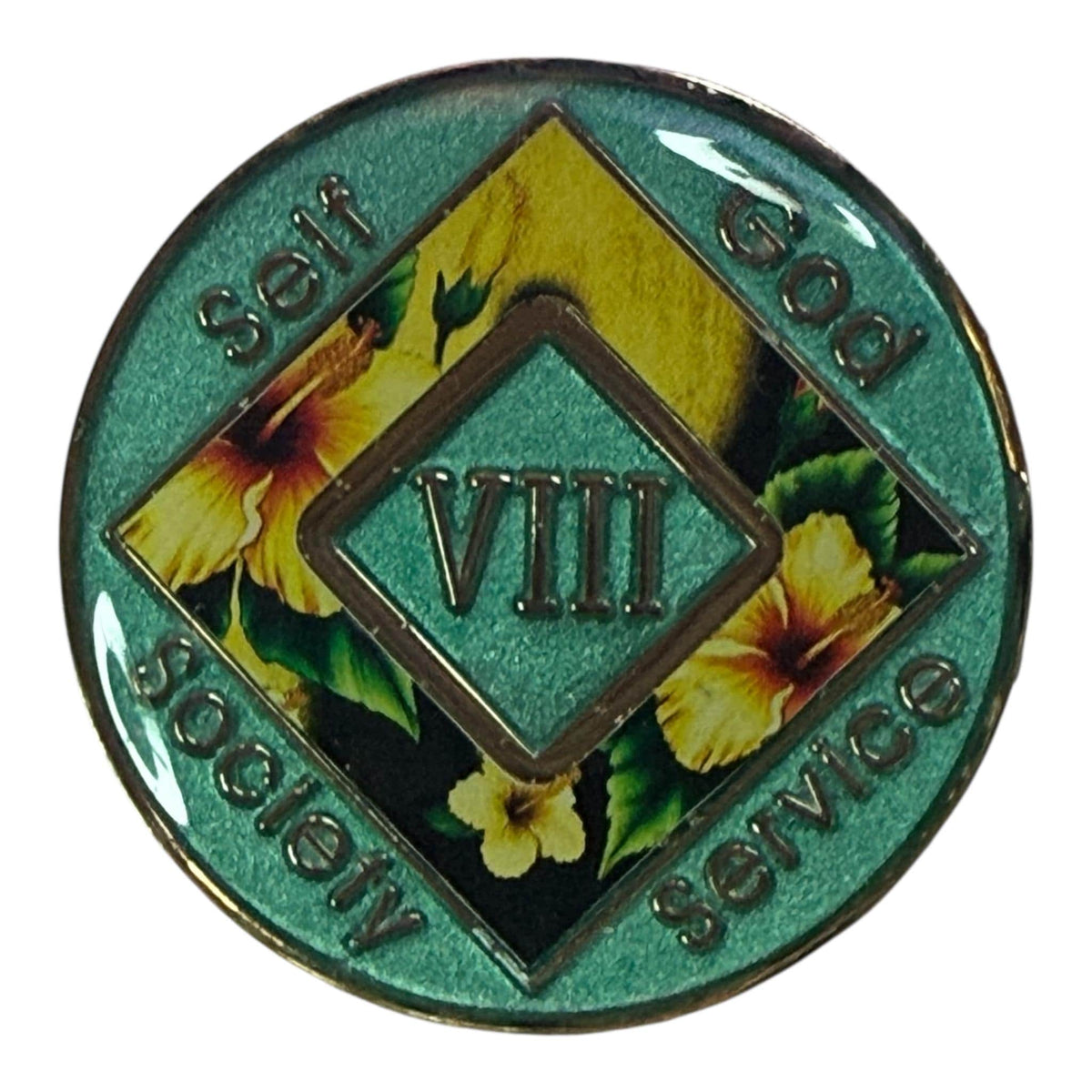 Narcotics Anonymous 8-year recovery medallion featuring yellow hibiscus flowers and a gold yin-yang background. The NA symbol appears at the center with āSelf, God, Society, Serviceā inscribed around the edges, representing spiritual balance, growth, and long-term sobriety in recovery.