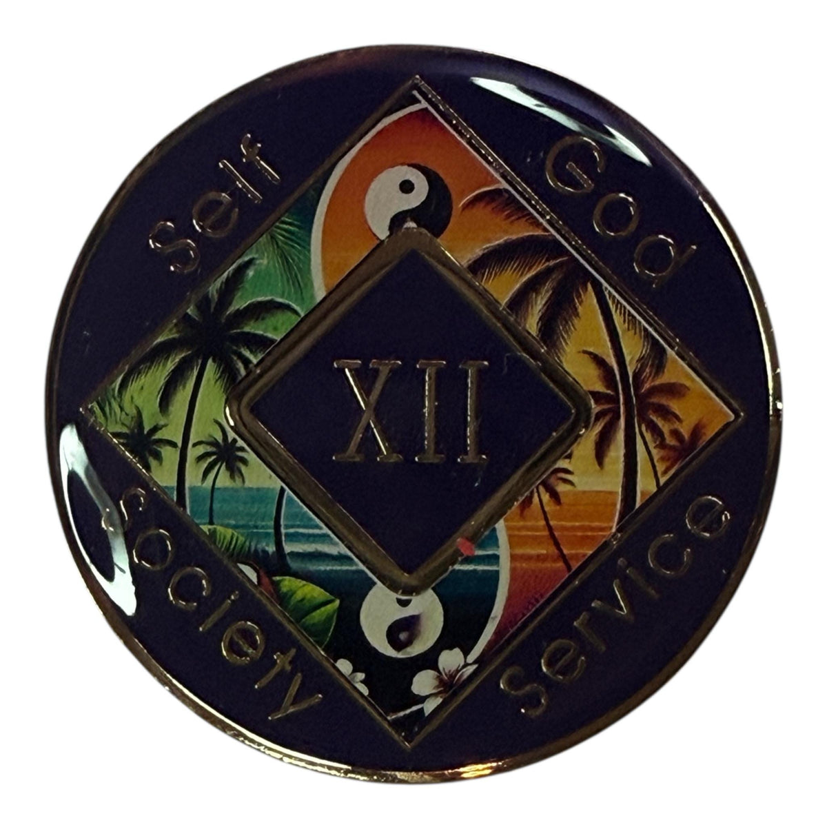 Narcotics Anonymous tropical medallion featuring palm trees, yin-yang symbols, and an ocean sunset, symbolizing balance and serenity in recovery. The coin displays āSelf, God, Society, Serviceā around the edges with Roman numeral XII representing 12 years clean and continued spiritual growth.