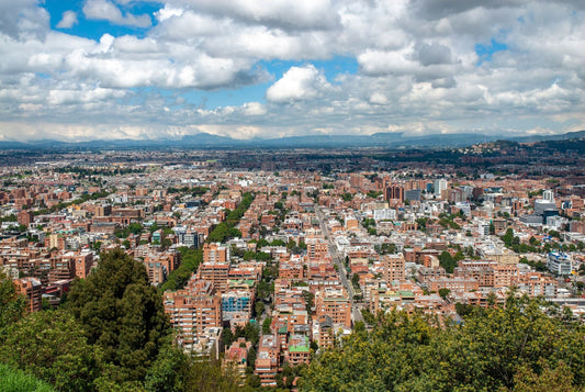 Aerial view of Bogotá’s skyline and surrounding Andes mountains