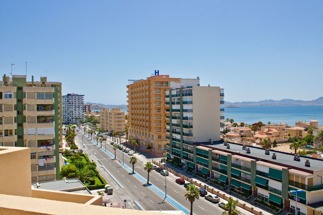 Aerial view of La Manga del Mar Menor with coastal buildings and blue water