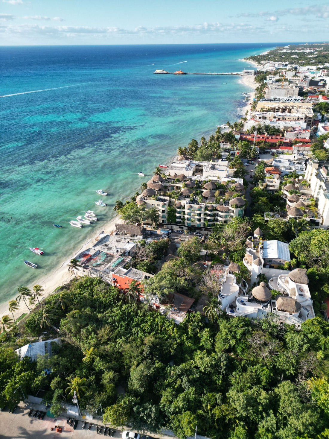 Turquoise Caribbean water and beachfront along Playa del Carmen, Mexico, near the Riviera Maya.