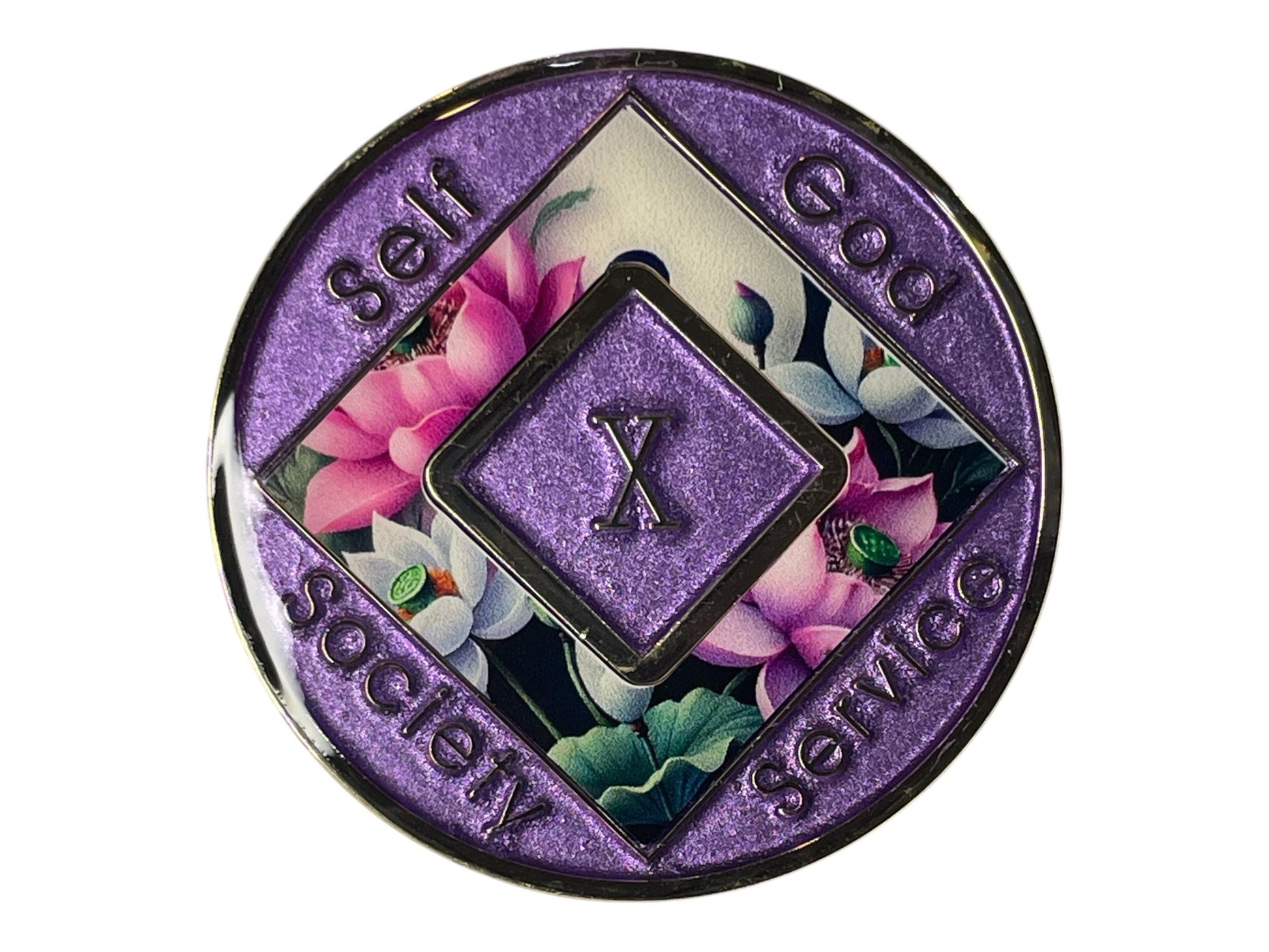 Narcotics Anonymous 10-year sobriety medallion with purple border, floral lotus design, and inscriptions Self, God, Society, Service surrounding the Roman numeral X.