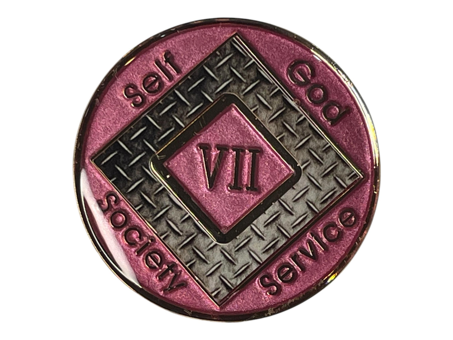 Narcotics Anonymous 7-year recovery medallion featuring a pink enamel finish with diamond plate steel texture. The center displays the Roman numeral “VII,” surrounded by the words “Self, God, Society, Service,” representing seven years clean and the strength, service, and balance found in recovery.