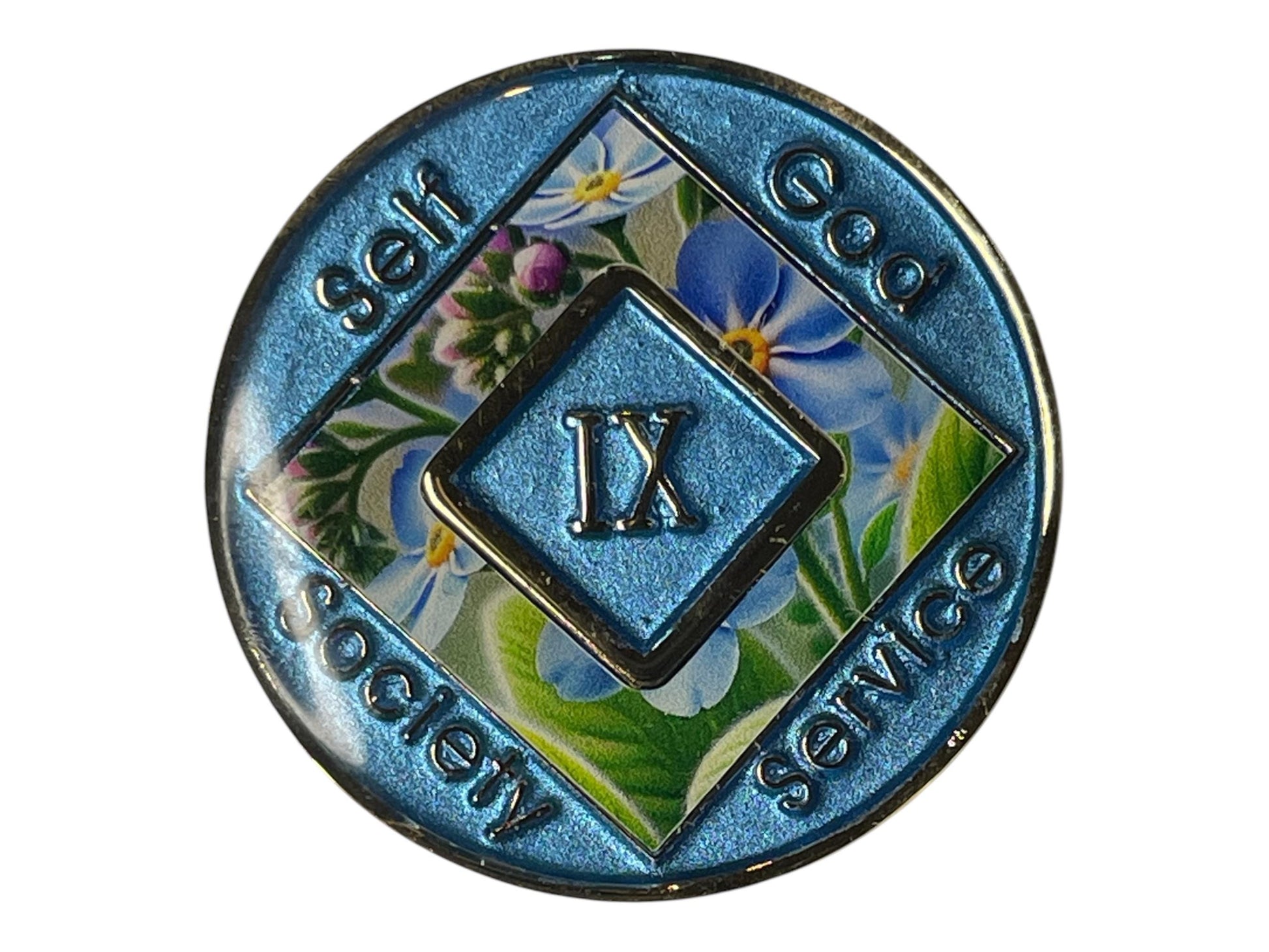 Narcotics Anonymous 9-year sobriety medallion with blue metallic border, floral background, and the words Self, God, Society, Service surrounding the Roman numeral IX.