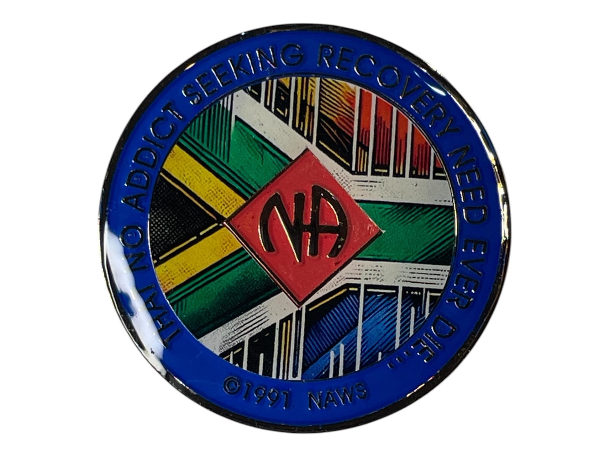 Narcotics Anonymous recovery medallion featuring the South African flag design with vibrant red, green, yellow, blue, and black colors, symbolizing unity, diversity, and strength in addiction recovery.