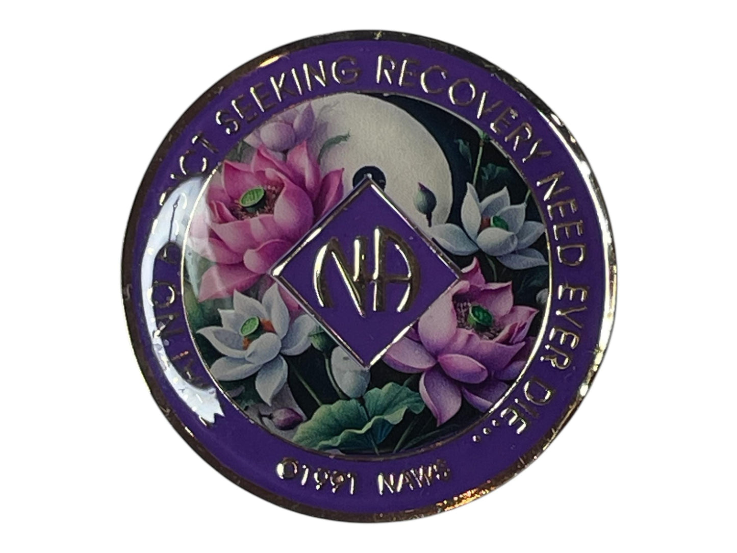 Narcotics Anonymous recovery medallion with deep purple border, NA diamond logo, and lotus flower artwork under a full moon, featuring the phrase ‘That No Addict Seeking Recovery Need Ever Die.
