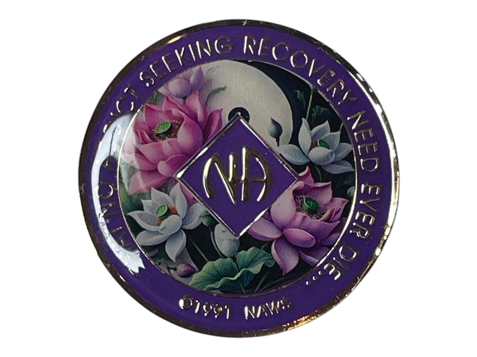 Narcotics Anonymous recovery medallion with deep purple border, NA diamond logo, and lotus flower artwork under a full moon, featuring the phrase ‘That No Addict Seeking Recovery Need Ever Die.