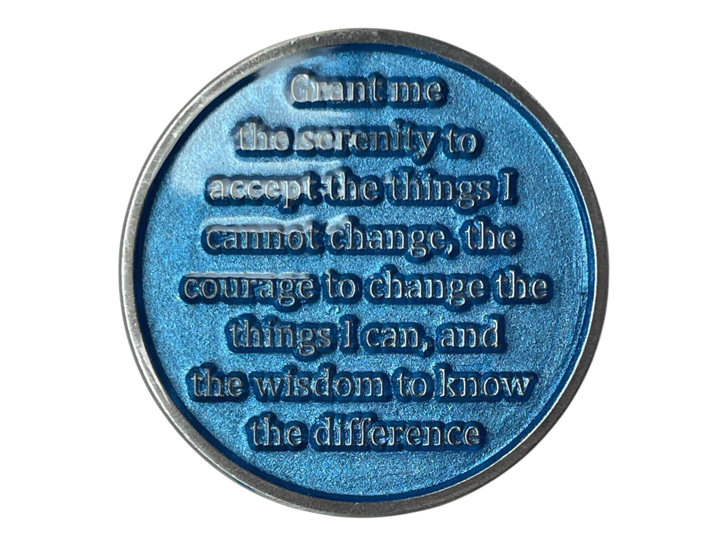 Blue AA medallion engraved with the Serenity Prayer: “Grant me the serenity to accept the things I cannot change, the courage to change the things I can, and the wisdom to know the difference.” The metallic blue finish symbolizes calm, strength, and peace found through recovery and spiritual growth.