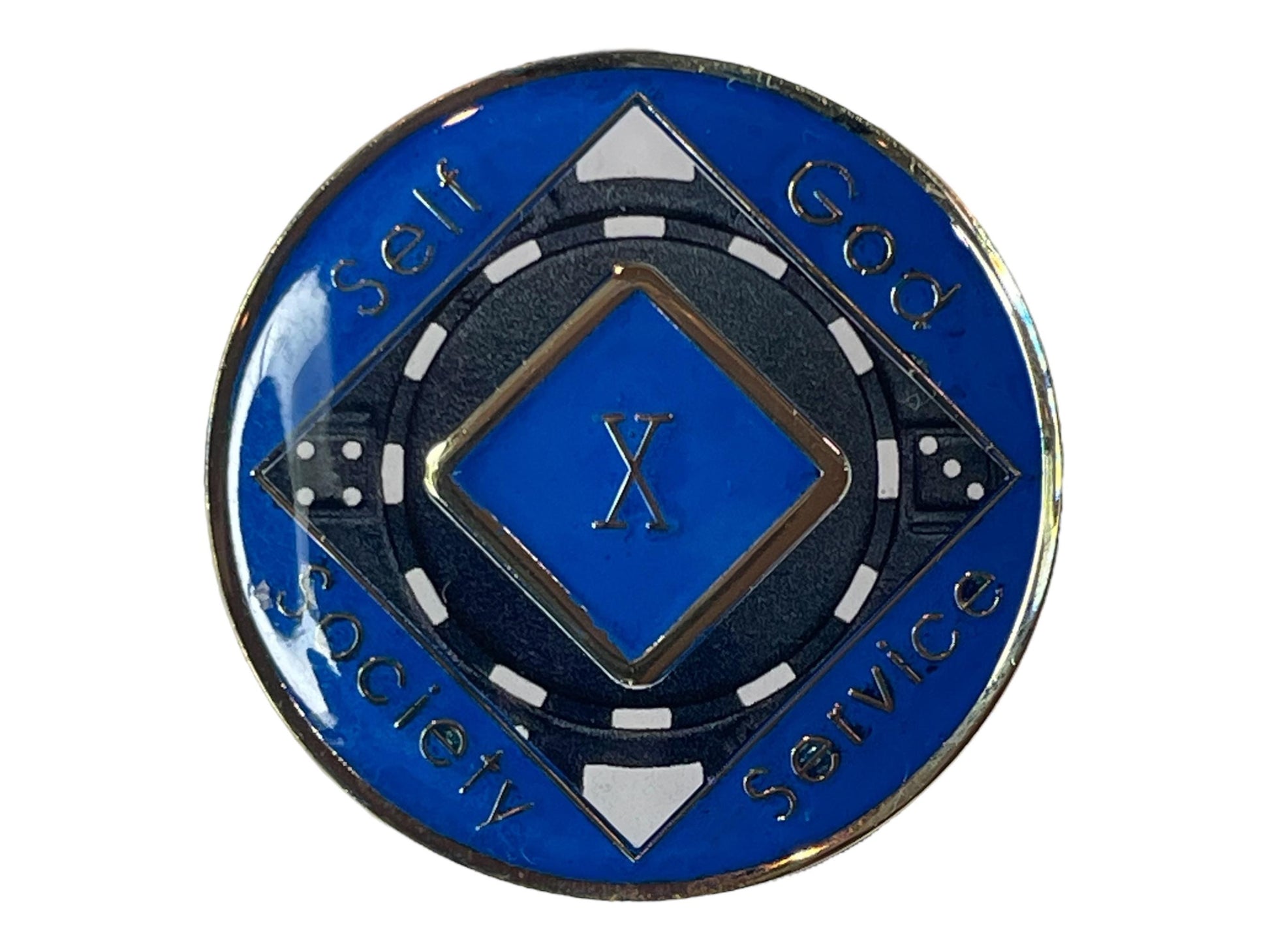 Narcotics Anonymous 10-year recovery medallion featuring a poker chip design with blue and black enamel. The center displays Roman numeral “X,” surrounded by the words “Self, God, Society, Service,” symbolizing a decade of sobriety, personal growth, and dedication to recovery within NA.
