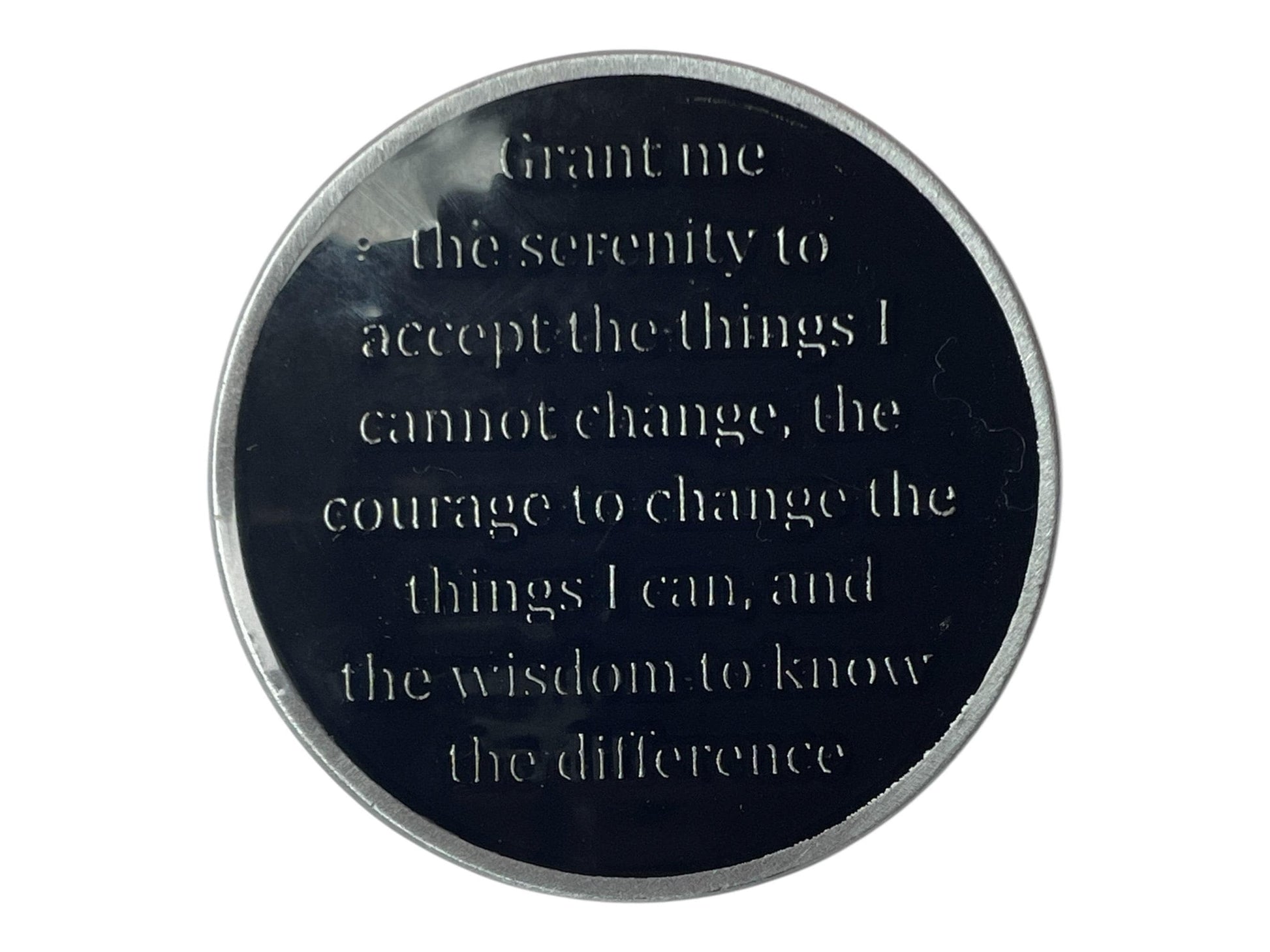 Black AA medallion featuring the Serenity Prayer engraved in silver text: “Grant me the serenity to accept the things I cannot change, the courage to change the things I can, and the wisdom to know the difference.” The sleek black and silver finish represents strength, clarity, and serenity in recovery.