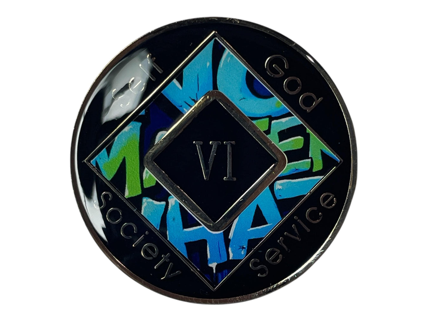 A black and silver coin with a blue, green, and white design. The coin has a black square in the center with the number 'VI' in white text. The coin has the words 'God', 'Self', 'Service', 'Society', around the outside of the coin.