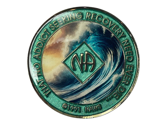 Narcotics Anonymous recovery medallion featuring a powerful ocean wave design with teal and blue tones, symbolizing strength, renewal, and the ongoing journey of addiction recovery.