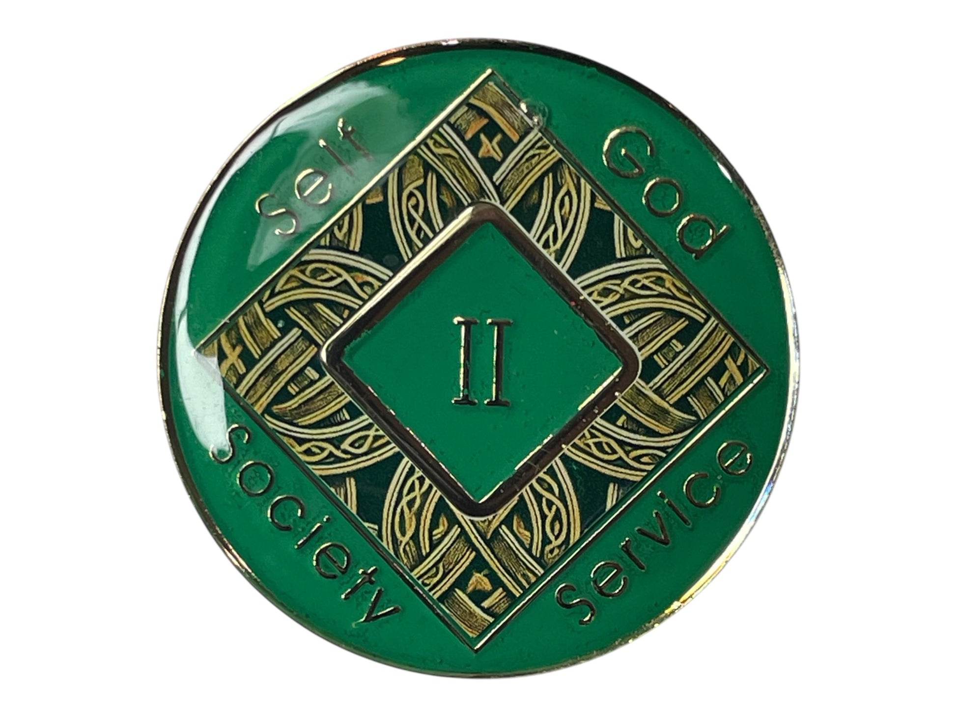 Narcotics Anonymous Celtic knot medallion in green enamel with intricate gold knotwork, Roman numeral II in the center, and the words “Self, God, Society, Service,” symbolizing two years clean and the interconnected journey of faith, unity, and recovery.