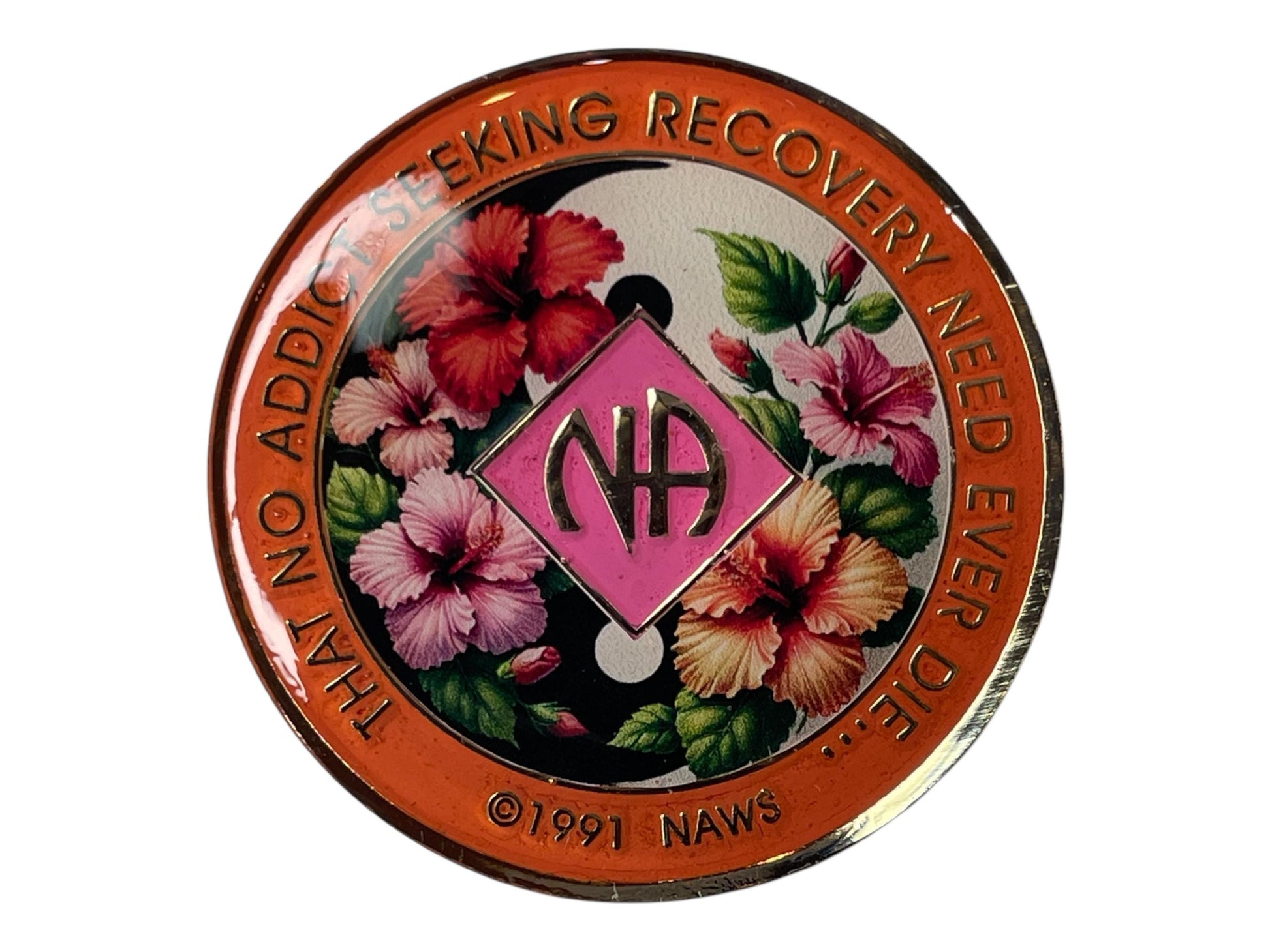 Narcotics Anonymous recovery medallion featuring a vibrant hibiscus flower design with a yin-yang background, symbolizing balance, serenity, and growth in recovery. The medallion has an orange border engraved with “That No Addict Seeking Recovery Need Ever Die,” with the NA logo centered in pink, representing healing, harmony, and new beginnings.