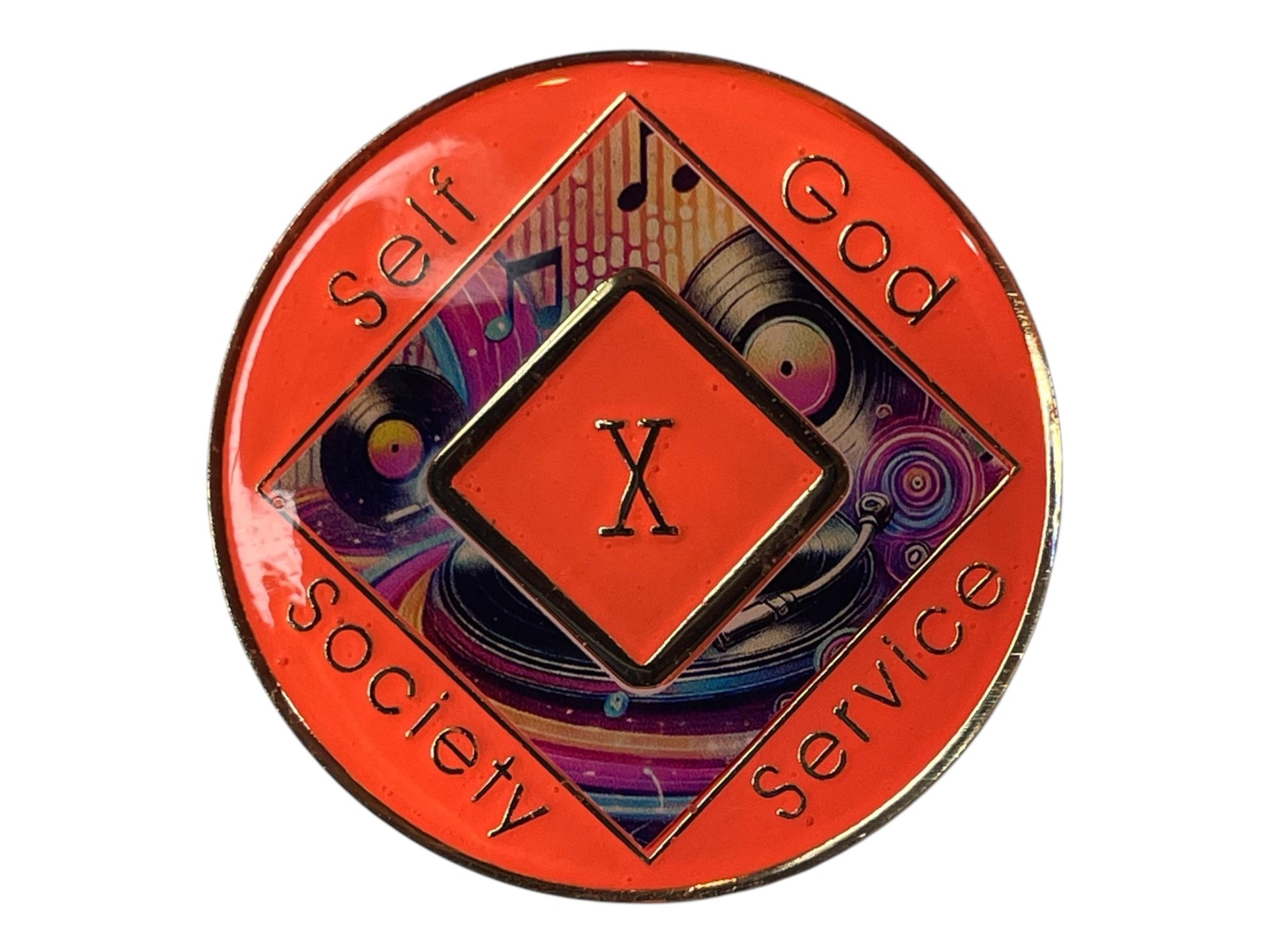 Narcotics Anonymous 10-year sobriety medallion with vibrant orange border, music-themed artwork featuring vinyl records and musical notes, and the words Self, God, Society, Service surrounding the Roman numeral X.