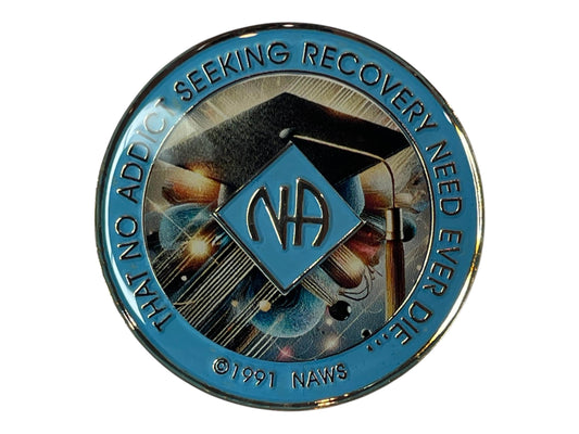 Narcotics Anonymous recovery medallion featuring a graduation cap and diploma design, symbolizing achievement, growth, and the continuous pursuit of knowledge and freedom in sobriety.
