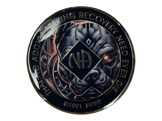 Narcotics Anonymous recovery medallion with black border, NA diamond logo, and fierce dog artwork, featuring the phrase ‘That No Addict Seeking Recovery Need Ever Die.’