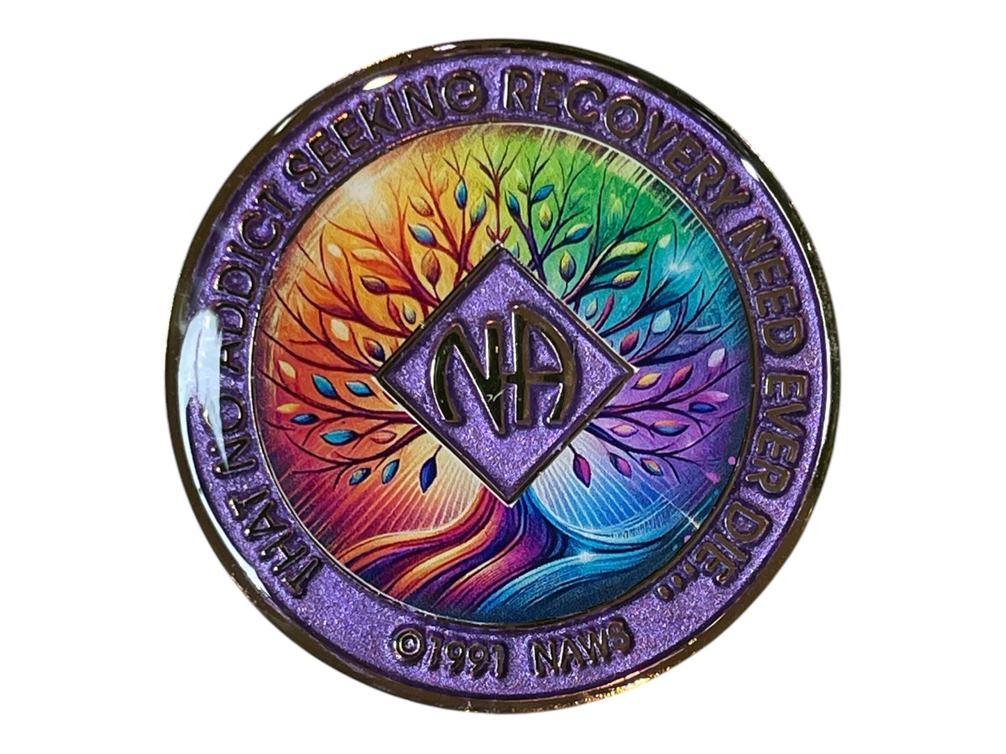 Narcotics Anonymous purple glitter recovery medallion featuring a vibrant rainbow Tree of Life design with NA logo and the phrase ‘That no addict seeking recovery need ever die,’ symbolizing hope, unity, and spiritual growth in addiction recovery.
