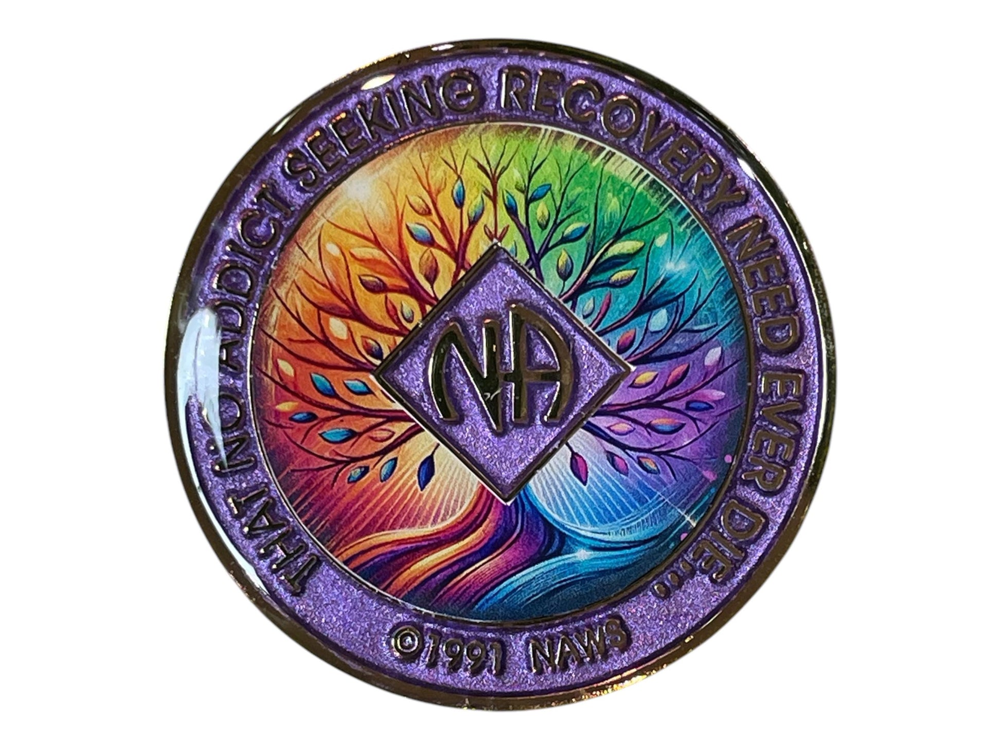 Narcotics Anonymous purple glitter recovery medallion featuring a vibrant rainbow Tree of Life design with NA logo and the phrase ‘That no addict seeking recovery need ever die,’ symbolizing hope, unity, and spiritual growth in addiction recovery.