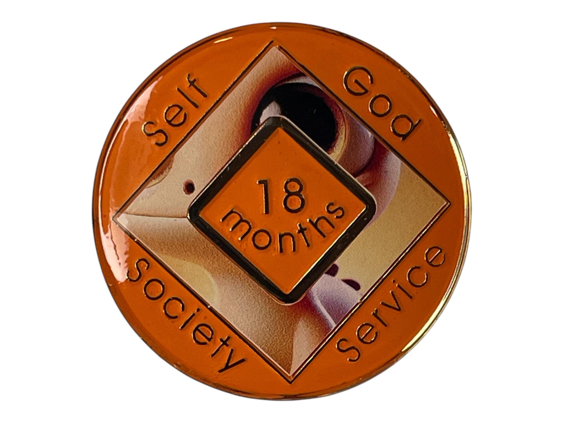 Narcotics Anonymous orange 18-month recovery medallion featuring a baby dragon design with the words ‘Self, God, Society, Service,’ symbolizing growth, perseverance, and dedication in addiction recovery.