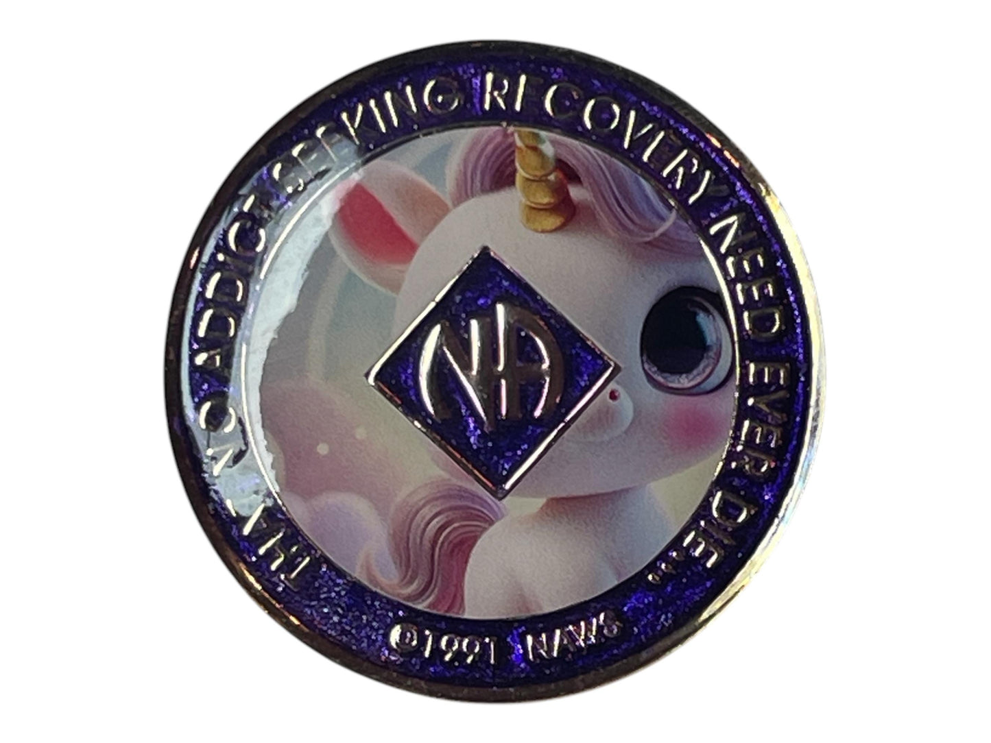 Narcotics Anonymous 4-year recovery medallion featuring a cute pastel unicorn with a golden horn, symbolizing hope, innocence, and transformation in recovery. The coin has a glittery purple background with the NA logo and Roman numeral IV in the center, surrounded by the words “Self, God, Society, Service,” representing balance, growth, and spiritual renewal on the journey of sobriety.