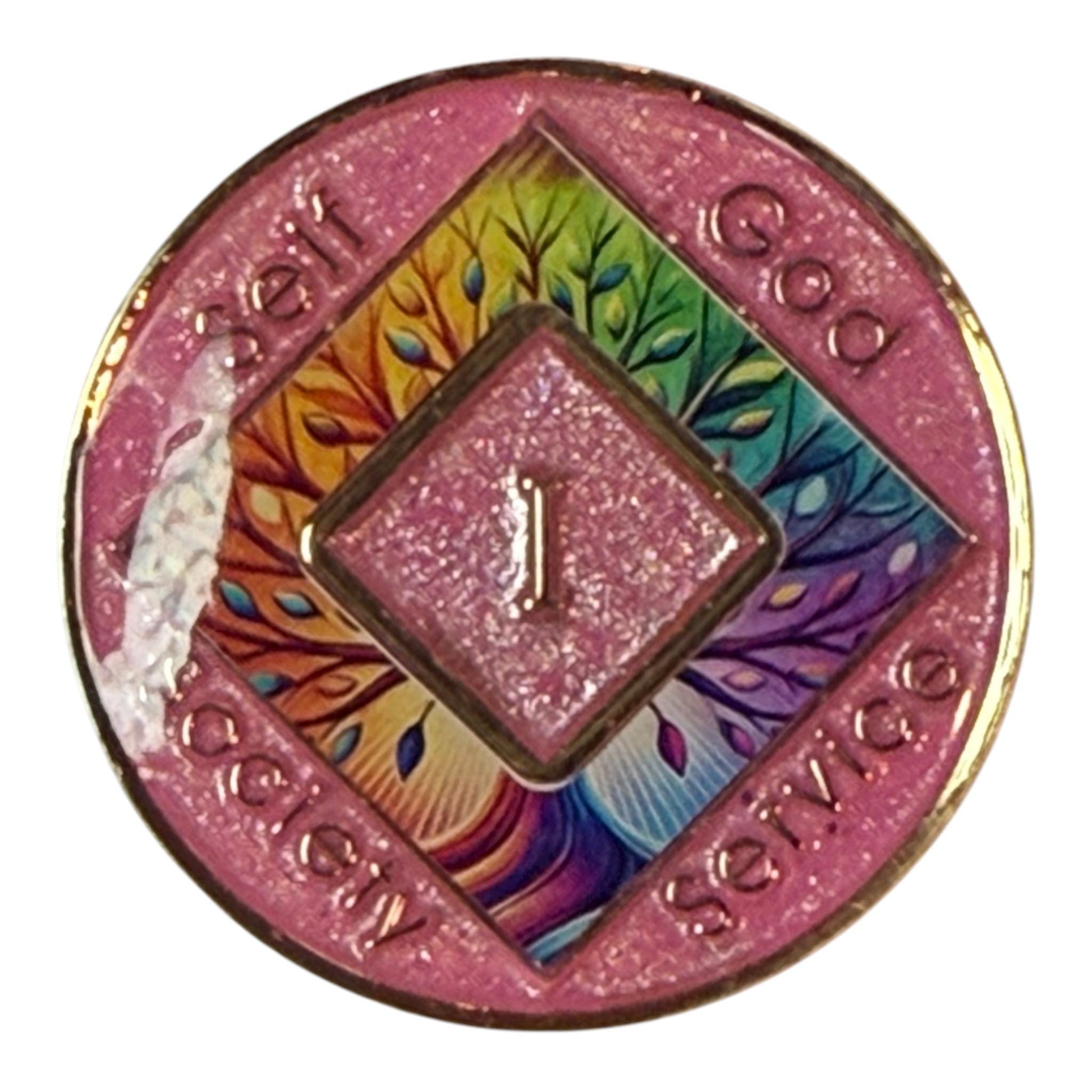 Narcotics Anonymous pink glitter recovery medallion featuring a rainbow Tree of Life design with the number 1 in the center, symbolizing one year clean and the four principles of Self, God, Society, and Service in addiction recovery.
