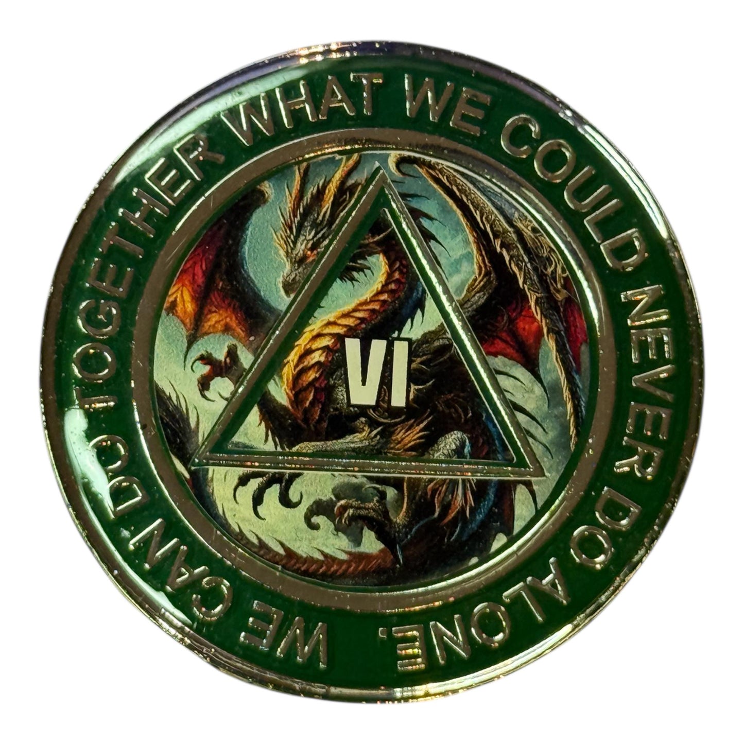 Green AA medallion featuring a powerful dragon design inside a triangle with the Roman numeral VI, representing 6 years of sobriety. The outer ring reads “We can do together what we could never do alone,” symbolizing unity, strength, and transformation in recovery.
